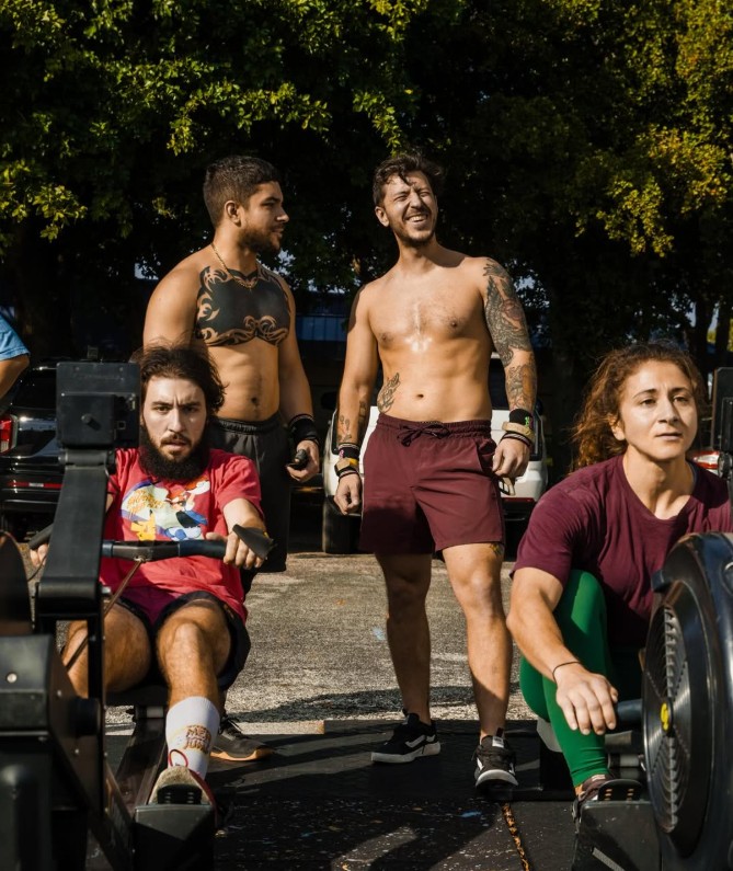 Brian Yepez with a group of clients during outdoor rowing training